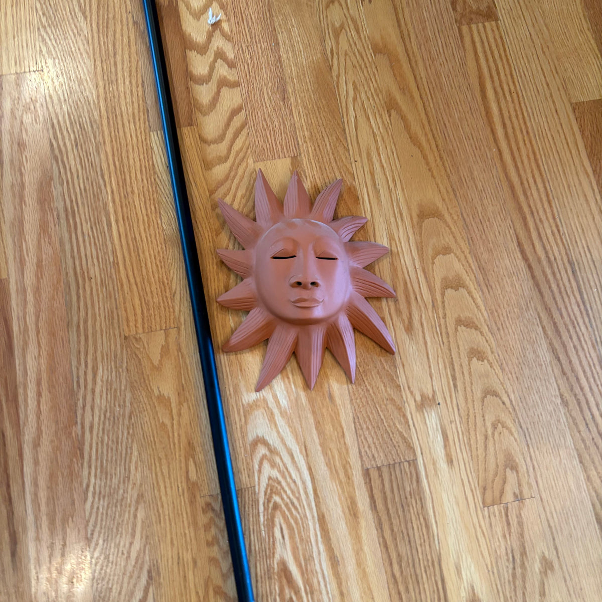 R186 Curtain rod and terracotta sun