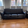 D103 Natuzzi Editions black leather couch