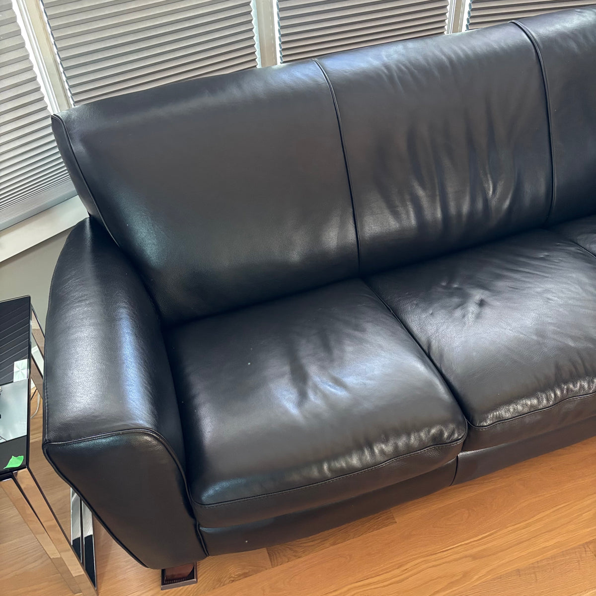 D103 Natuzzi Editions black leather couch