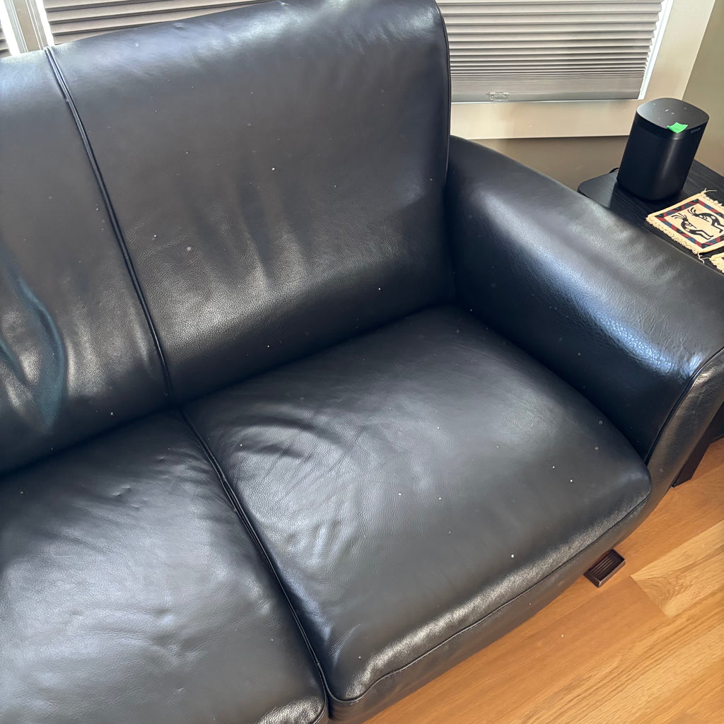 D103 Natuzzi Editions black leather couch
