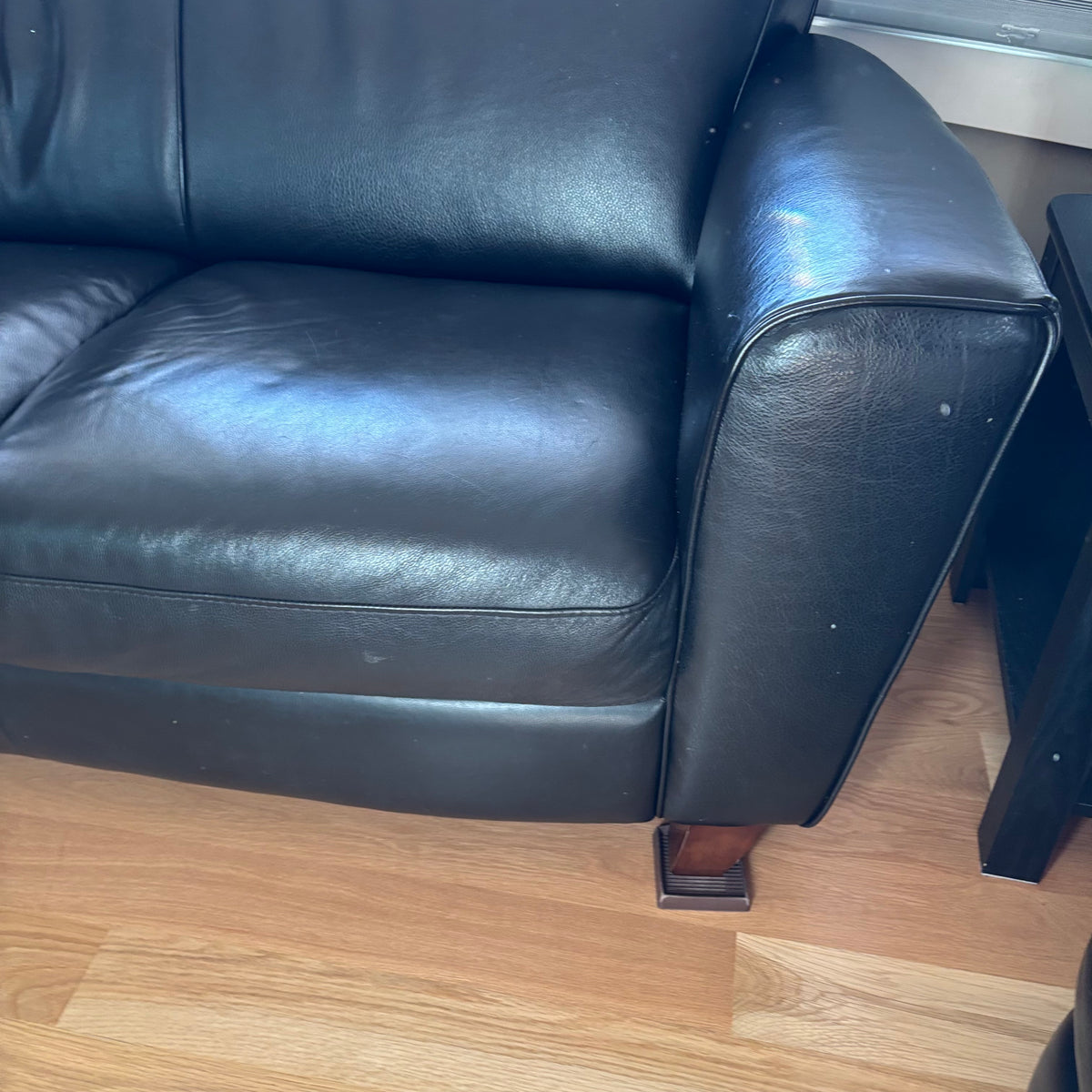 D103 Natuzzi Editions black leather couch