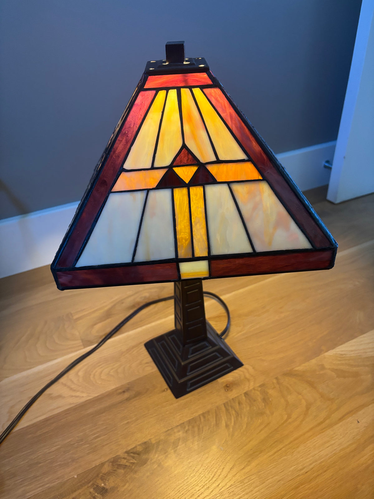 D114 19” Tall metal base lamp with stained glass lampshade