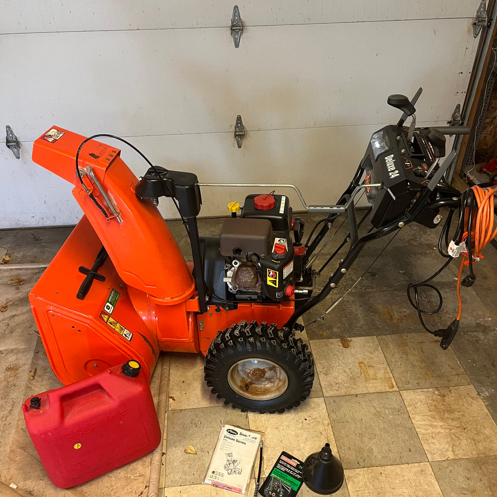 D340 Ariens Sno-Toro Deluxe series, model 811024 snow blower with jerry can