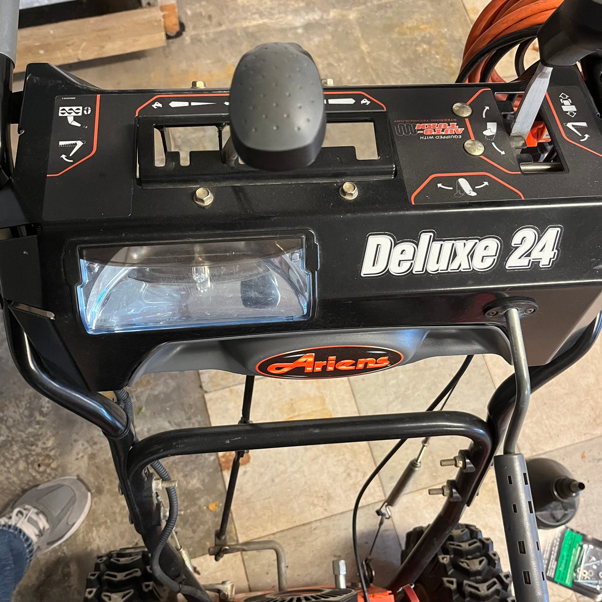 D340 Ariens Sno-Toro Deluxe series, model 811024 snow blower with jerry can