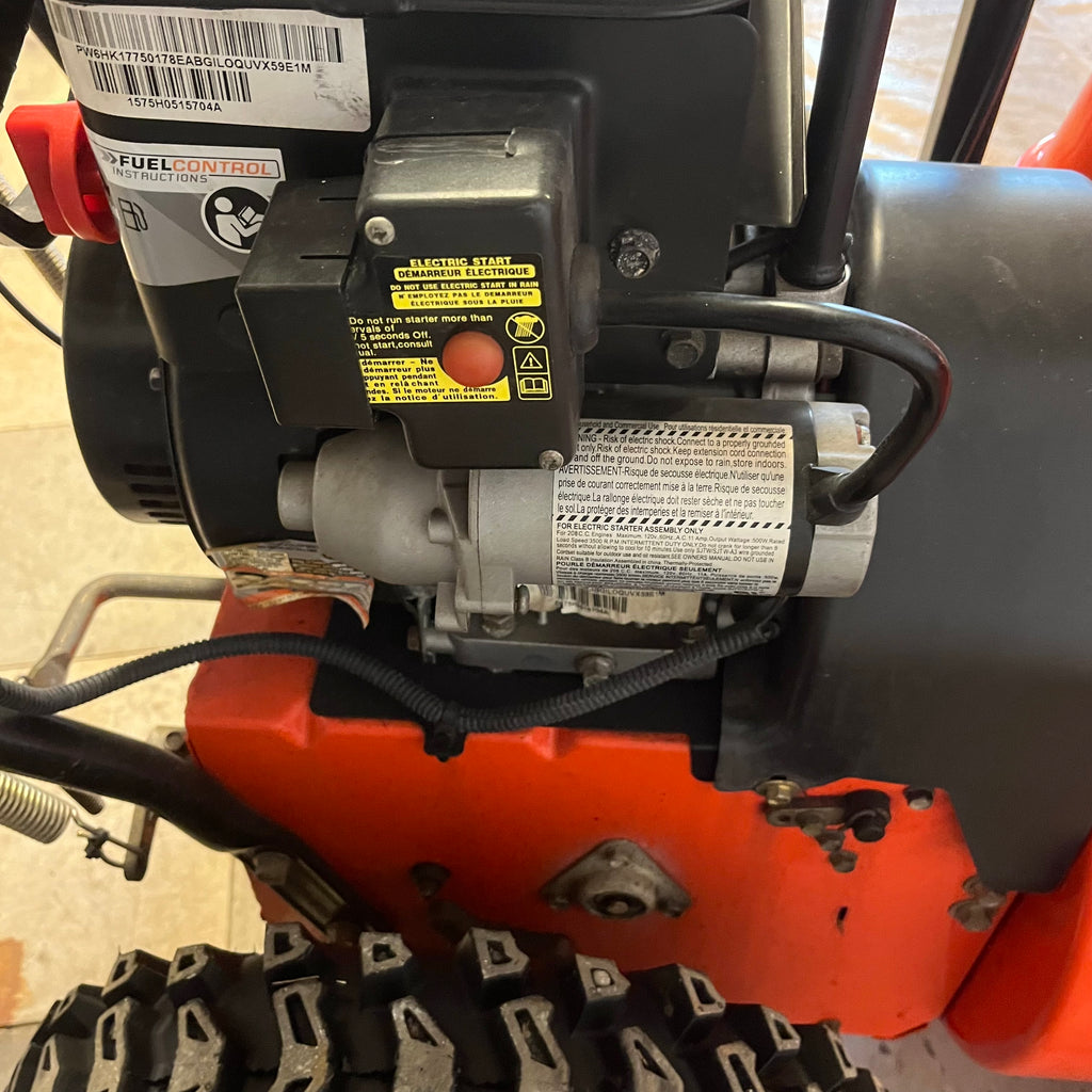 D340 Ariens Sno-Toro Deluxe series, model 811024 snow blower with jerry can