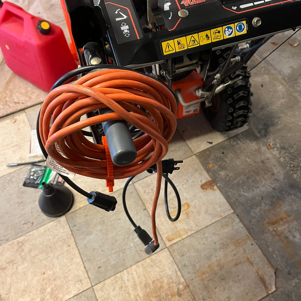 D340 Ariens Sno-Toro Deluxe series, model 811024 snow blower with jerry can