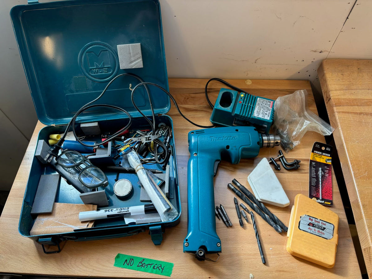 D242A Makita Drill with accessories (no battery)