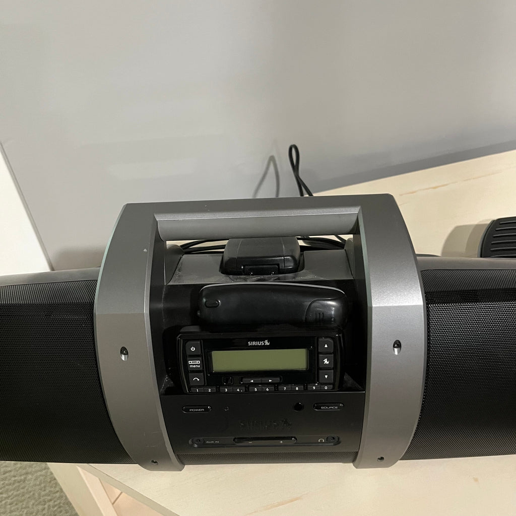 D351 Electronics Grouping( Sirius XM docking station and Casio keyboard)