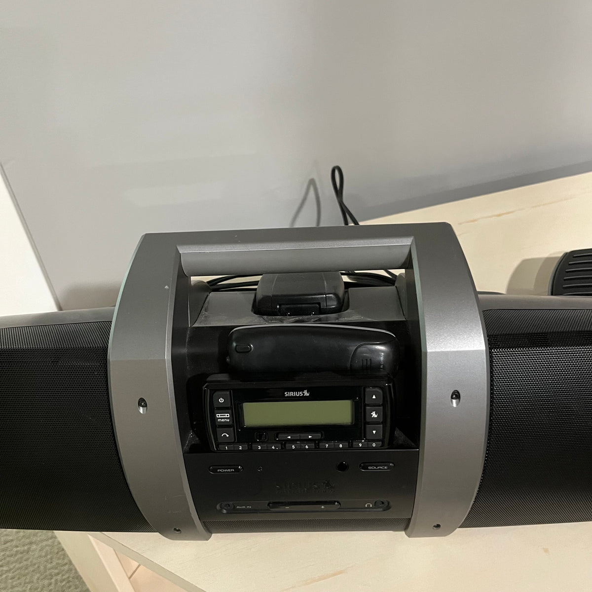 D351 Electronics Grouping( Sirius XM docking station and Casio keyboard)