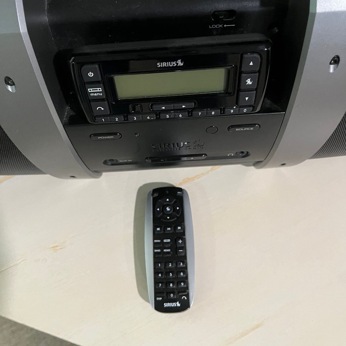 D351 Electronics Grouping( Sirius XM docking station and Casio keyboard)