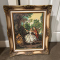 D142 25” x 21” Vintage ornate framed tapestry (couple in a garden)