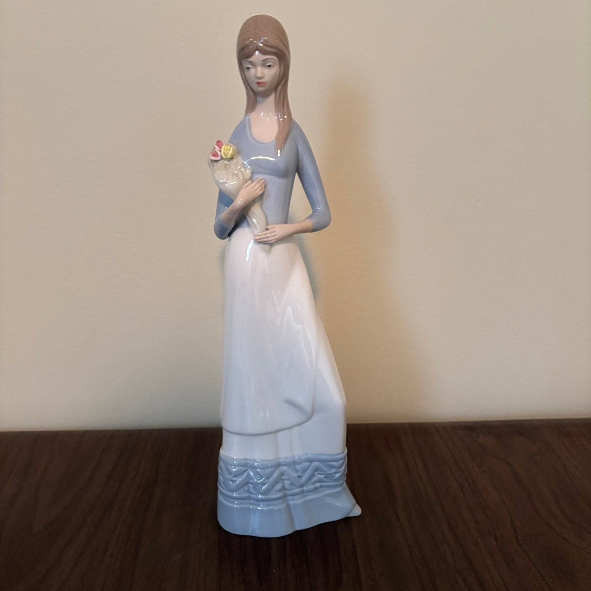 D149 13” Tall Vintage Miguel Requena lady with bouquet porcelain figurine