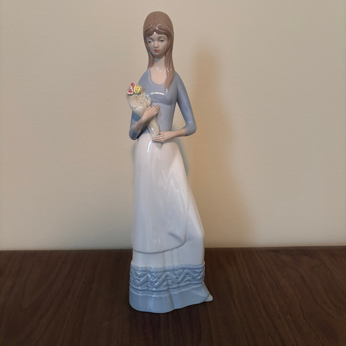 D149 13” Tall Vintage Miguel Requena lady with bouquet porcelain figurine