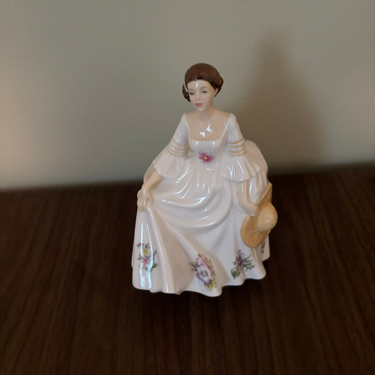 D151 Royal Albert "Dorothy" and Royal Doulton choir boy ceramic figurines