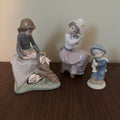 D155 Vintage Lladro and Nao ceramic figurines grouping