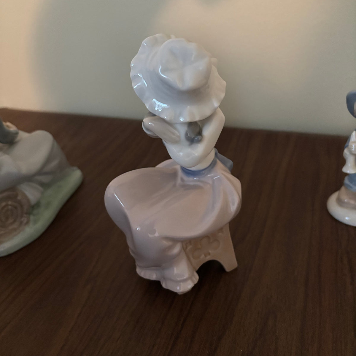 D155 Vintage Lladro and Nao ceramic figurines grouping