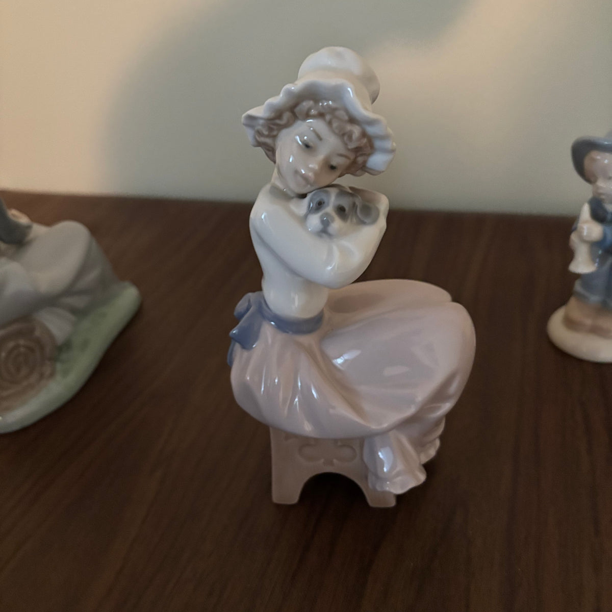 D155 Vintage Lladro and Nao ceramic figurines grouping