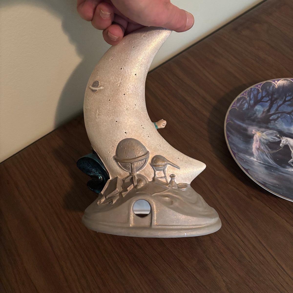 D171 Home Decor Grouping (half moon ceramic figurine and "Trails of Starlight" plate)