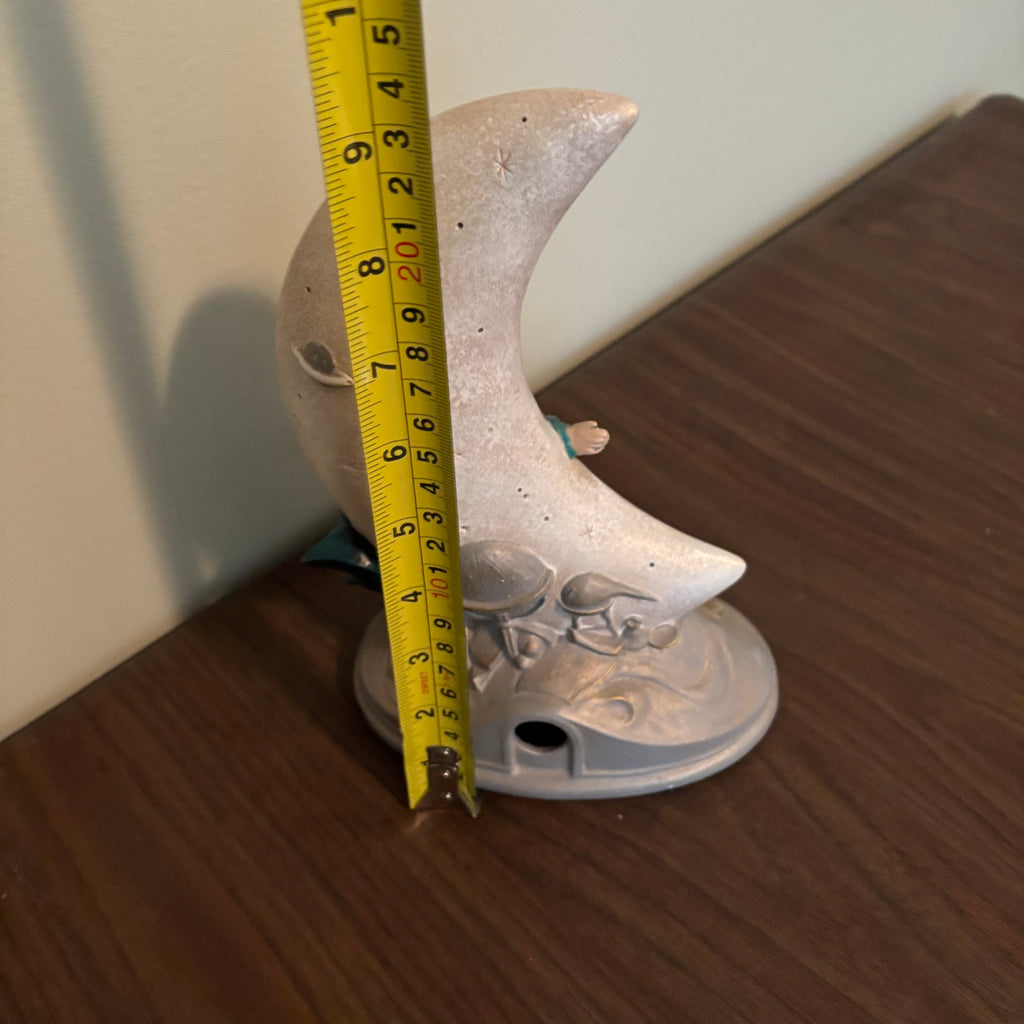 D171 Home Decor Grouping (half moon ceramic figurine and "Trails of Starlight" plate)
