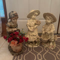 F198 3 22” tall stoneware garden figures