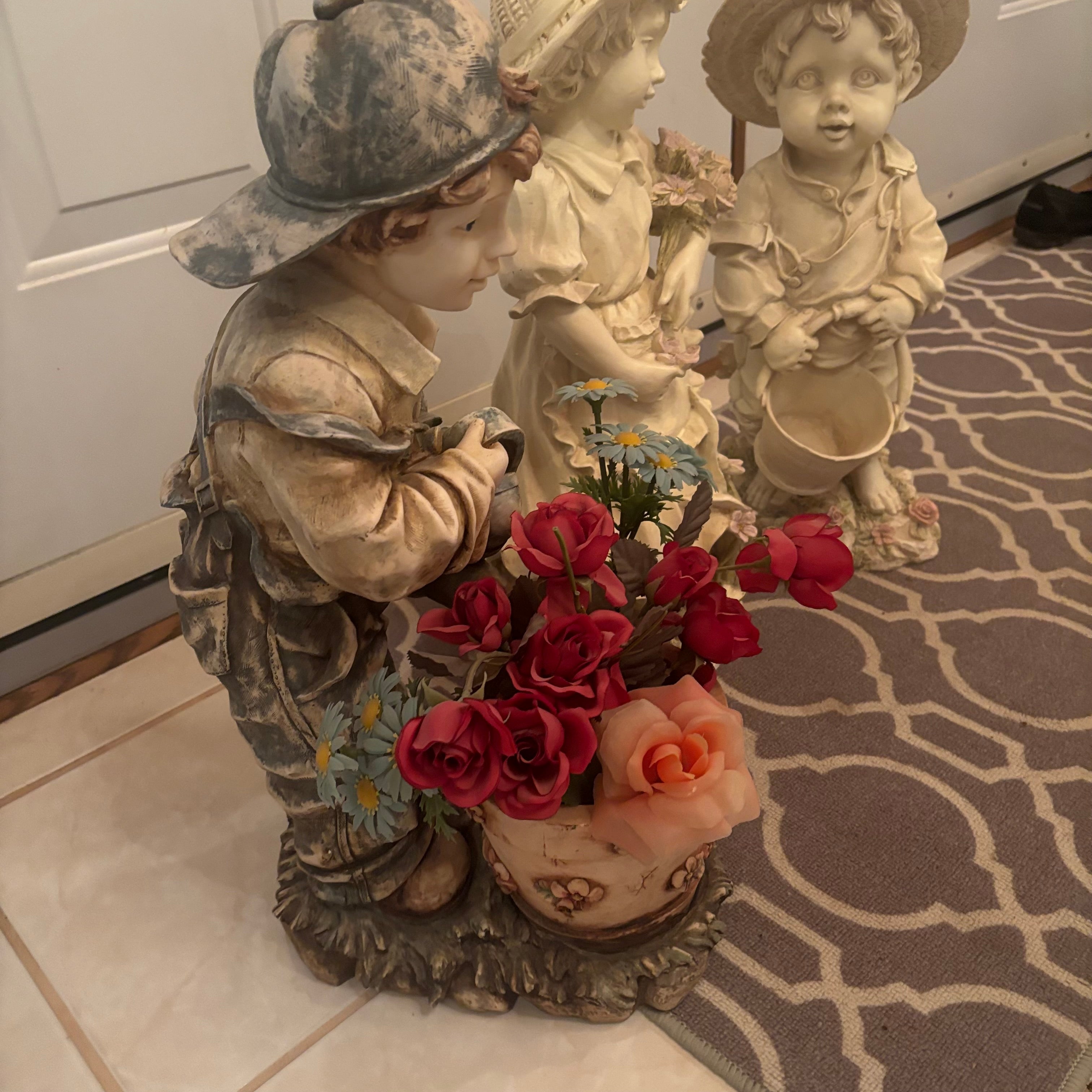 F198 3 22” tall stoneware garden figures