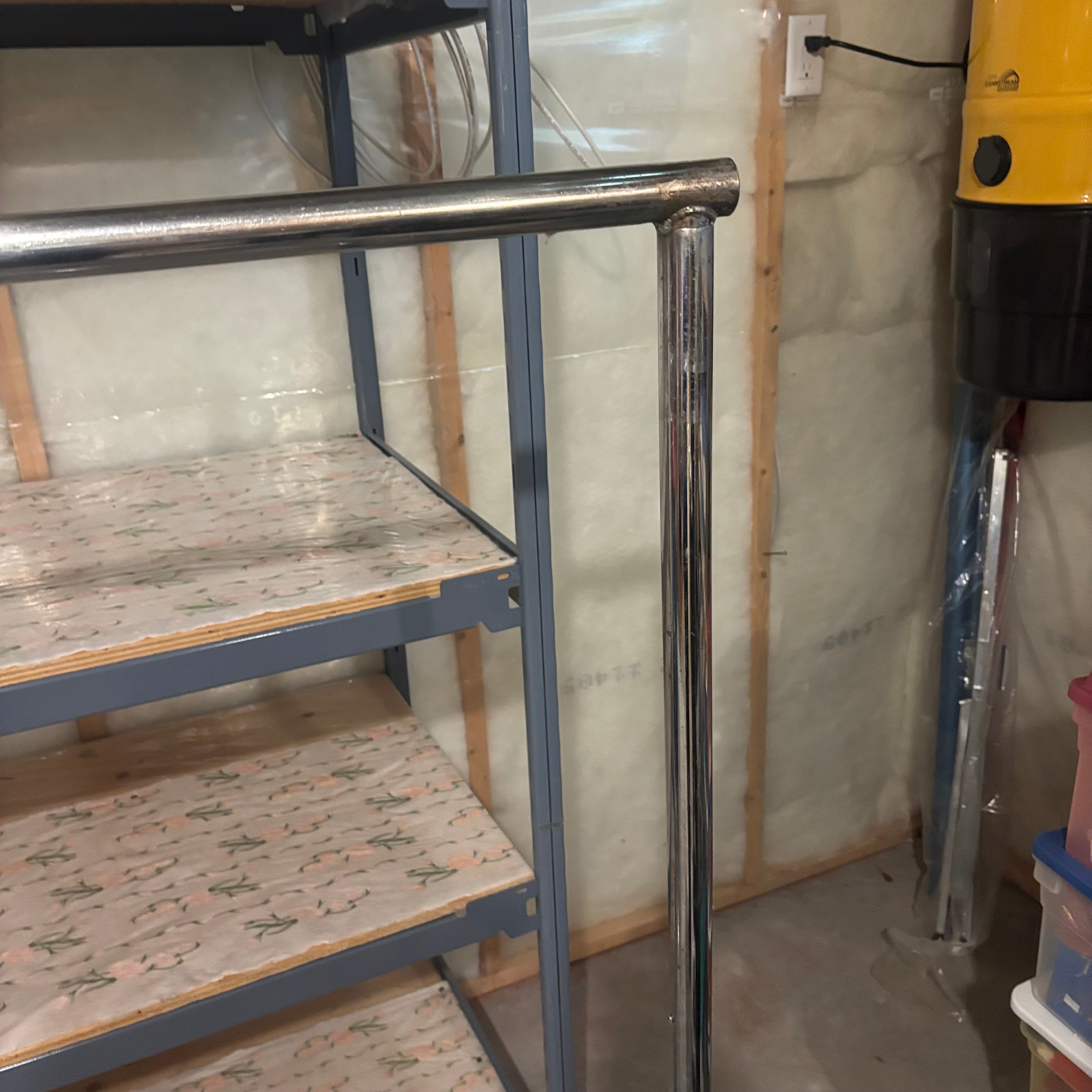 E869 Heavy duty metal clothing rack and vintage chest (shelf behind is not included)
