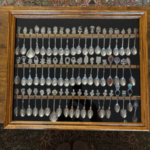 B491 Silver plated collector spoons in wooden display case