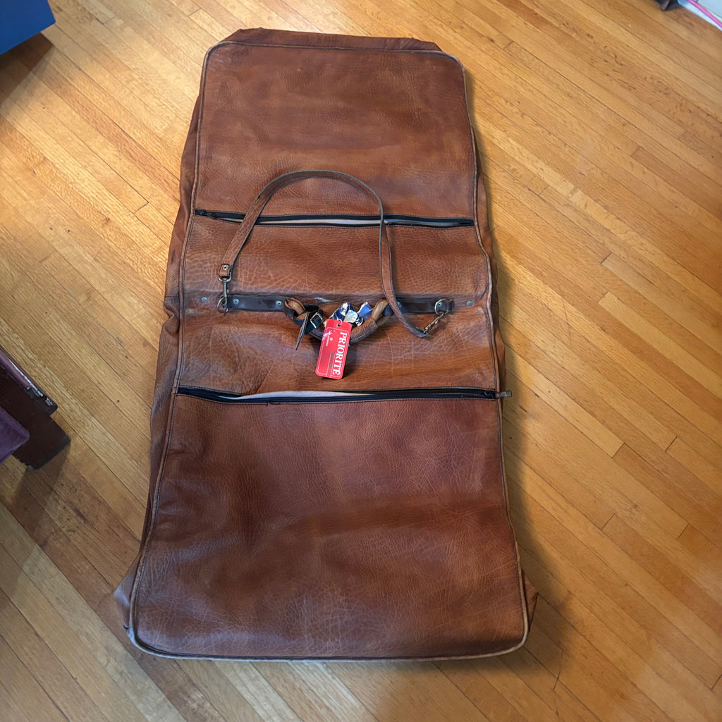 E121 Vintage leather bags grouping