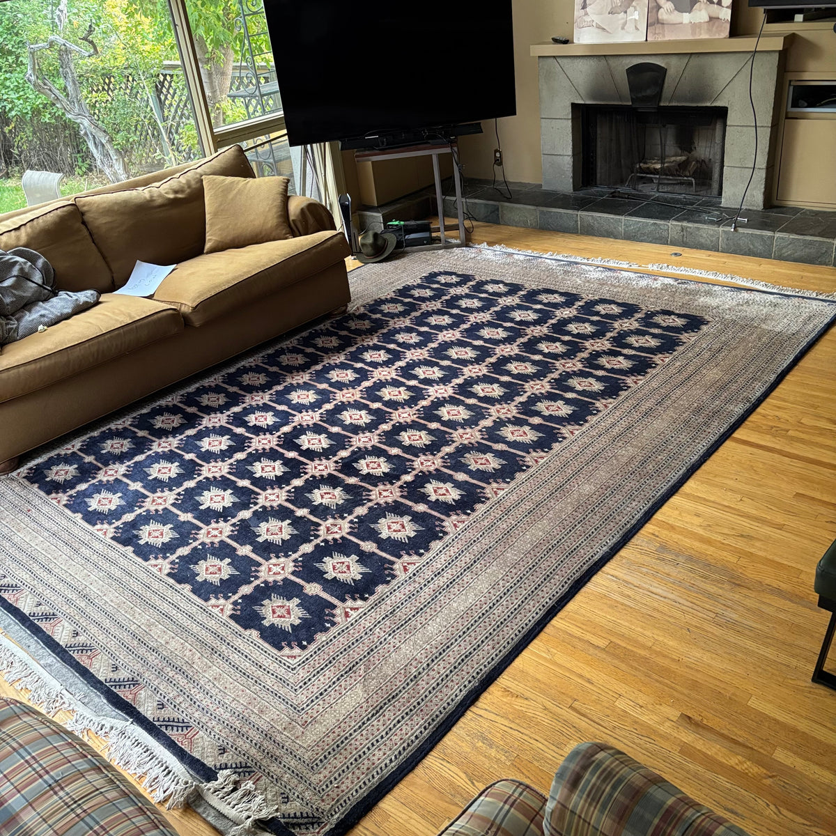 E129 109” x 150” Vintage wool rug with underlay (fringe is mostly separated)