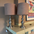 E104 Set of 2 20” tall table lamps with chrome bases and linen like shades