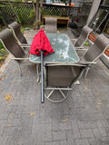 E323 Patio table with 6 chairs, red umbrella and umbrella stand