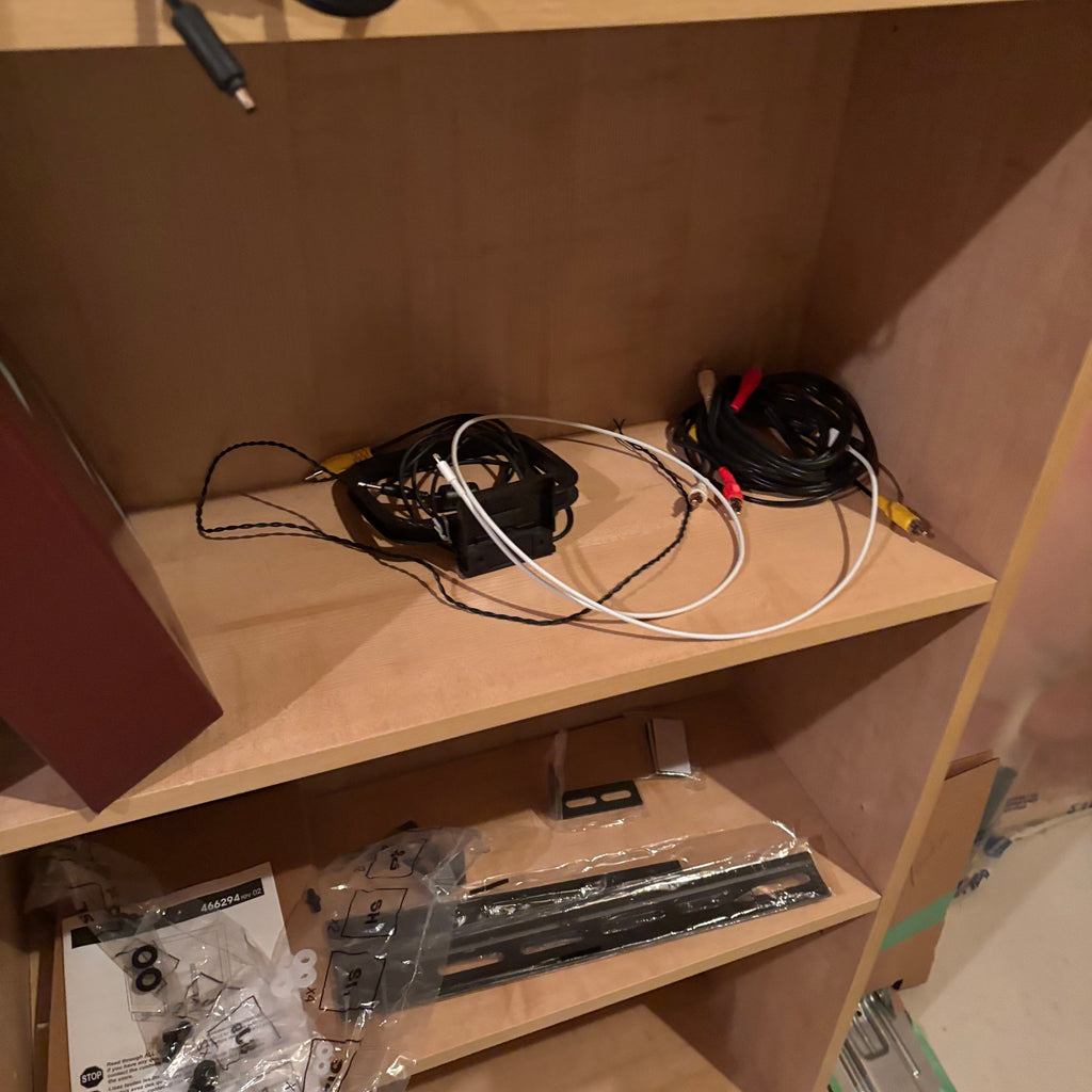 X228 2 Simple storage shelves with contents