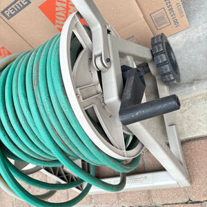 Hose Reel with Hose and White Bucket of Garden Tools - O115