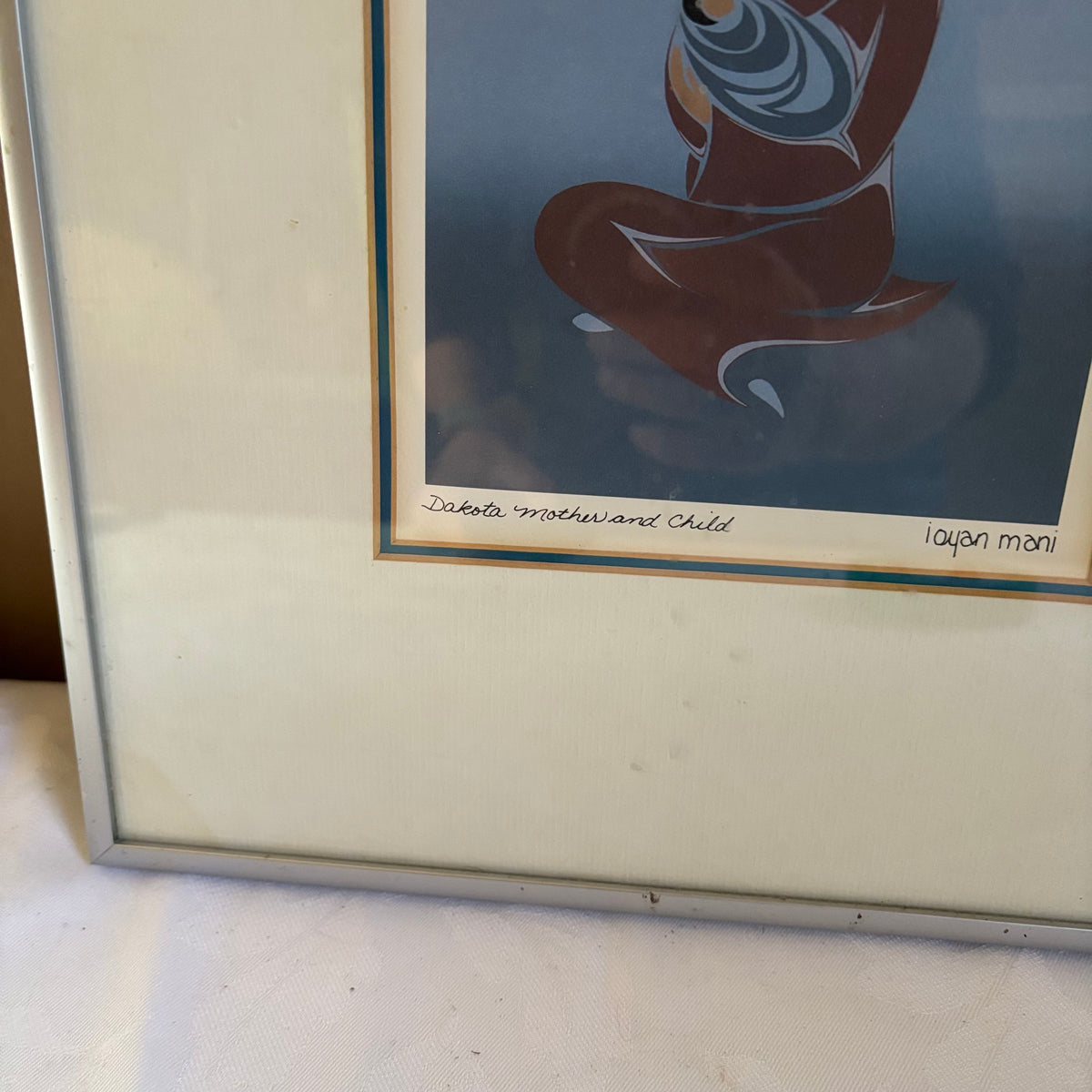 E149 Framed artwork and carving grouping