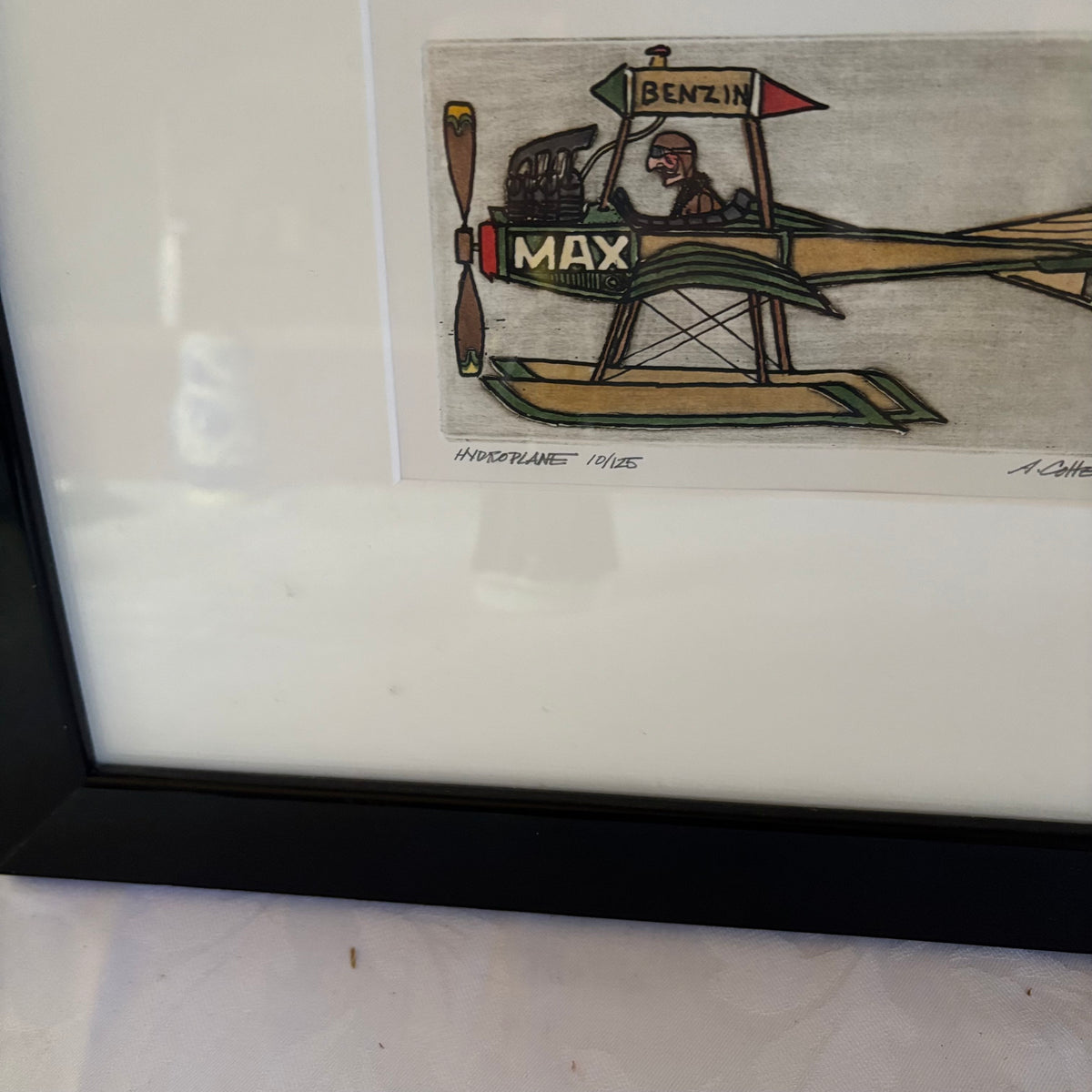 E142 Framed plane artwork grouping