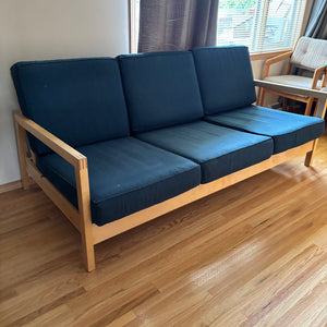 Sofa with wooden frame and blue cushions (cushions require cleaning) - L503
