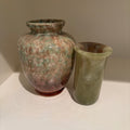 E864 Home decor grouping (stone vases)