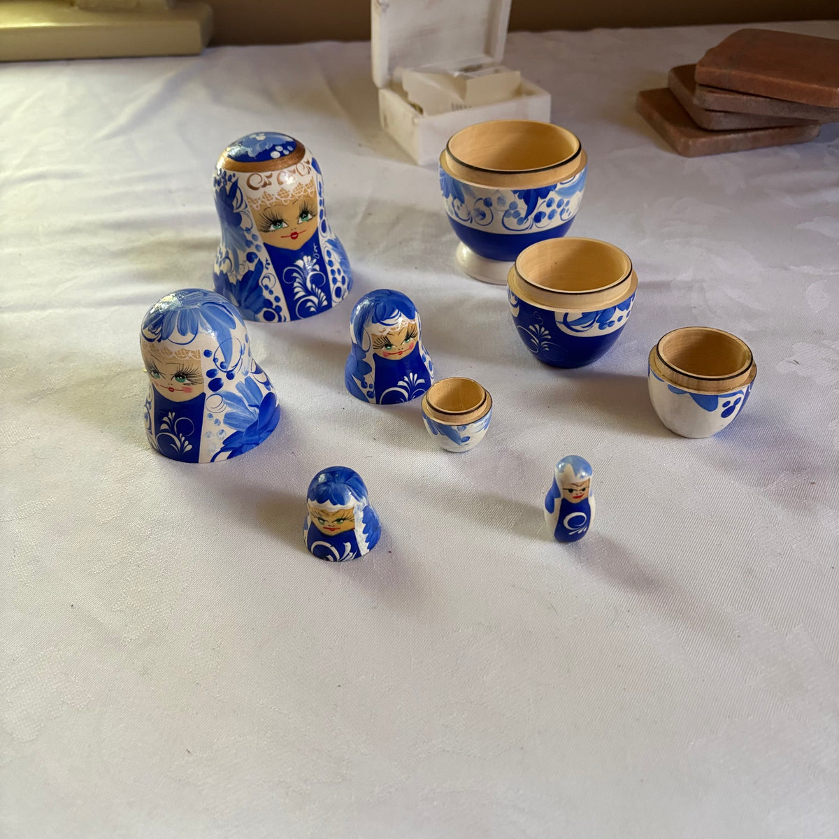 E143 Vintage wooden stacking dolls grouping