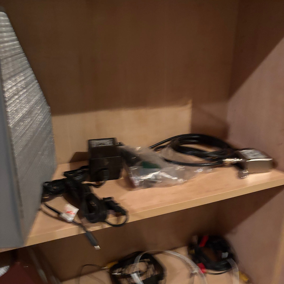 X228 2 Simple storage shelves with contents