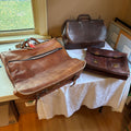 E121 Vintage leather bags grouping