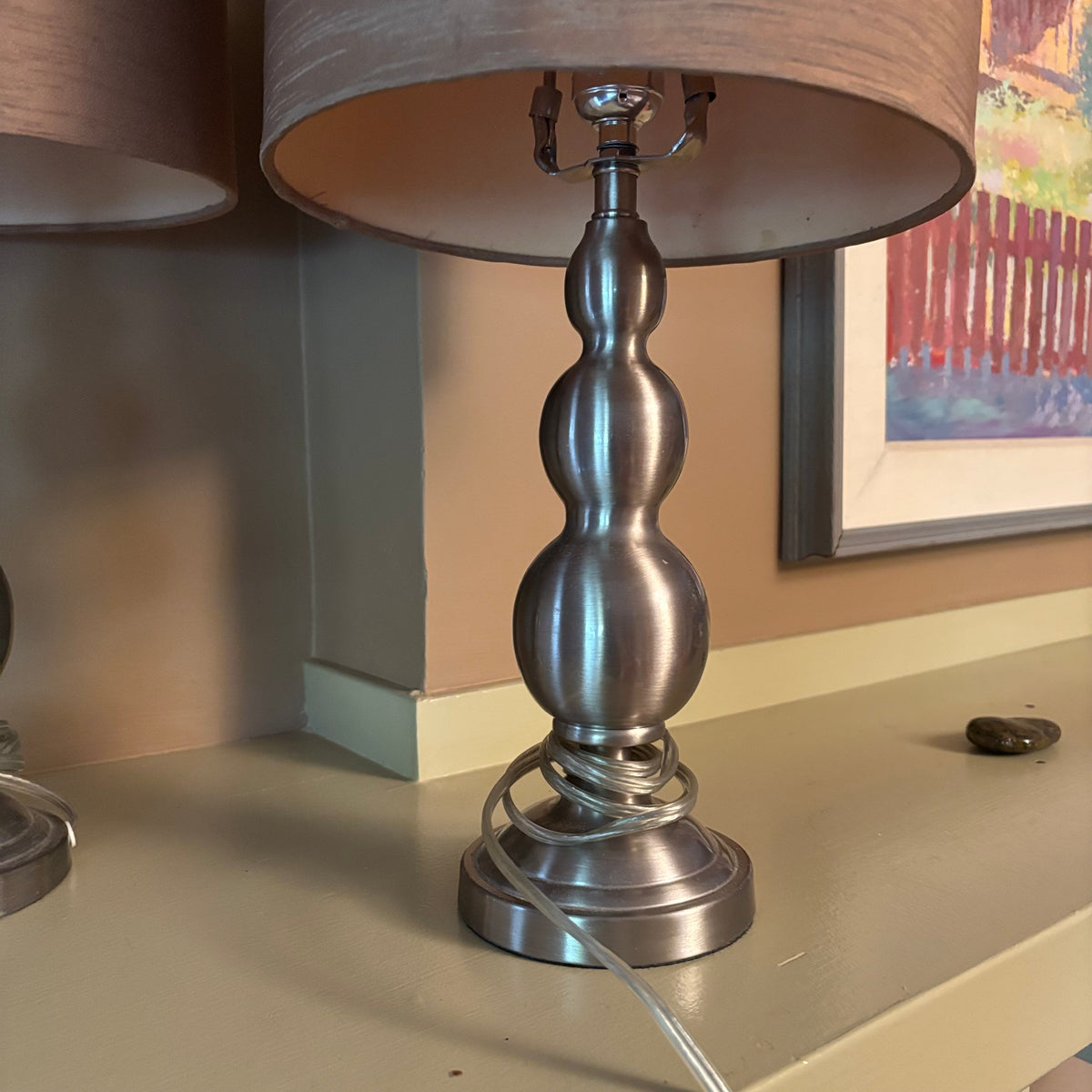 E104 Set of 2 20” tall table lamps with chrome bases and linen like shades
