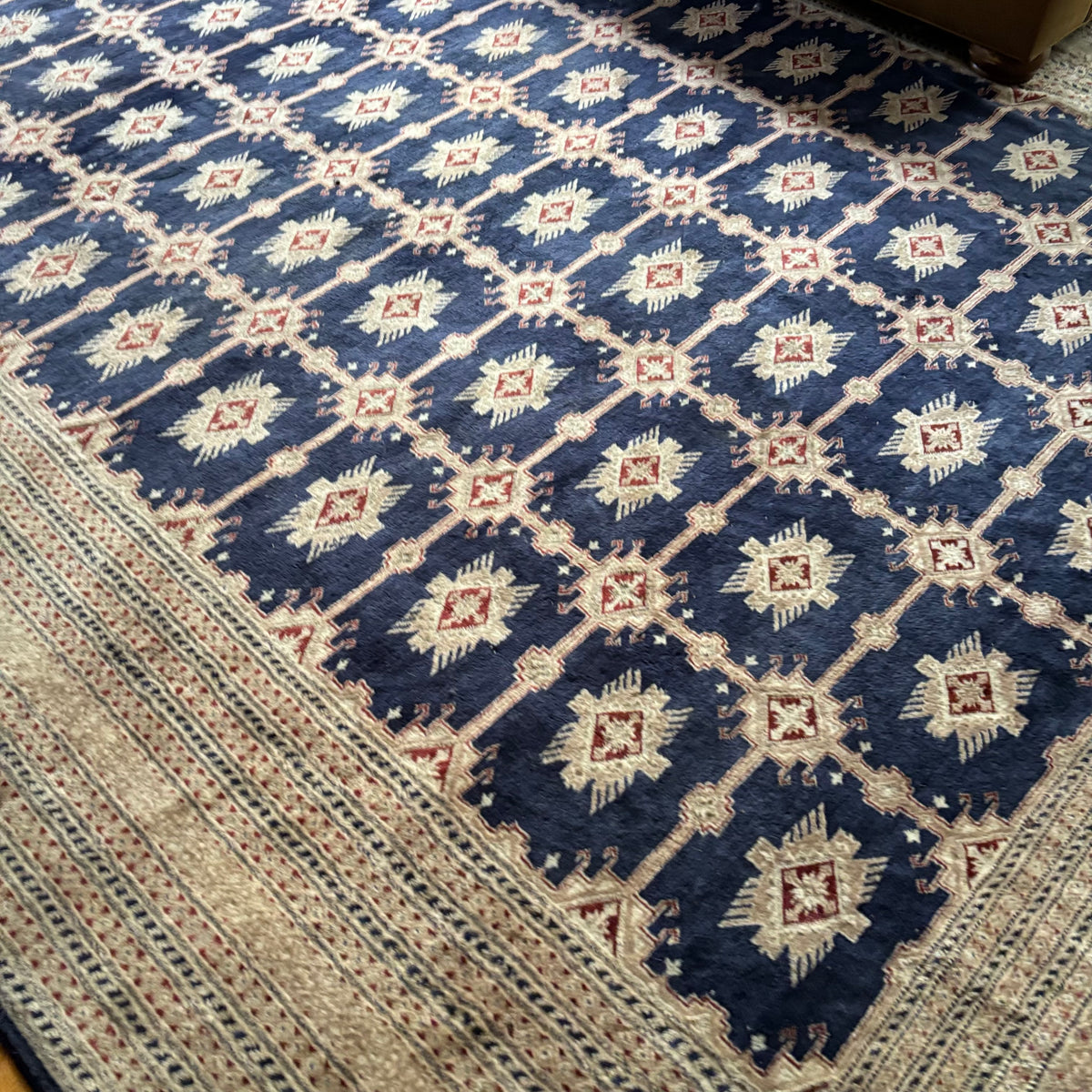 E129 109” x 150” Vintage wool rug with underlay (fringe is mostly separated)