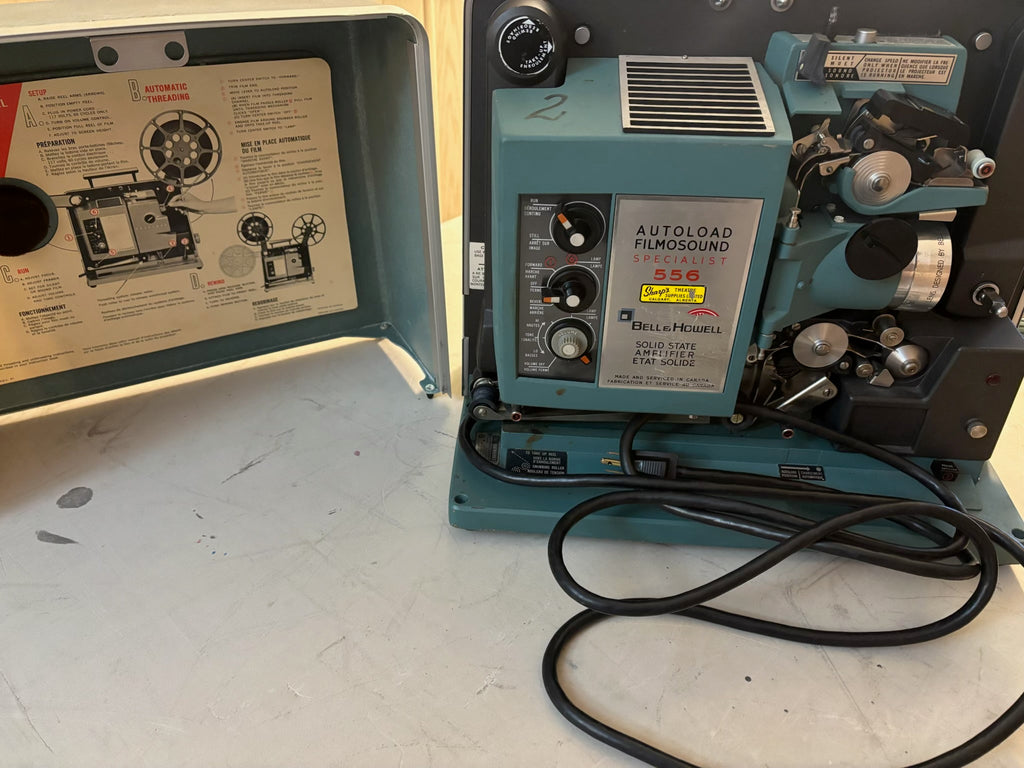 K510B Bell & Howell Model 556 Filmosound Specialist 16mm movie projector grouping