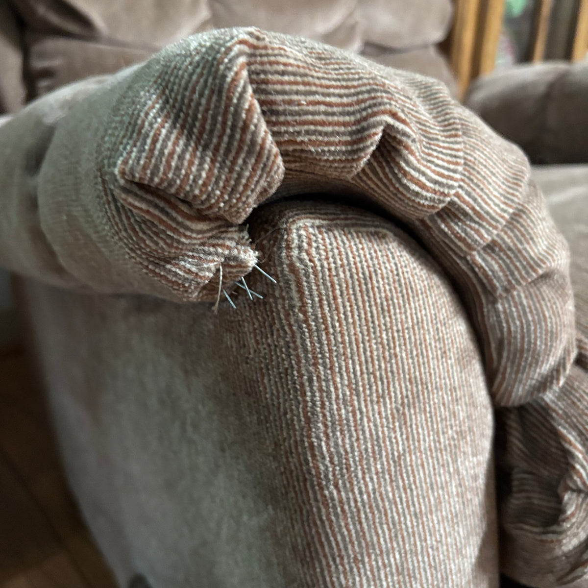 F188 Rocker recliner in beige corduroy fabric (in excellent condition except for a small tear in the corner)