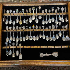 B490 Silver plated collector spoons in wooden display case