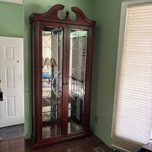 W849 Dark wood curio cabinet with glass shelves and mirrored back
