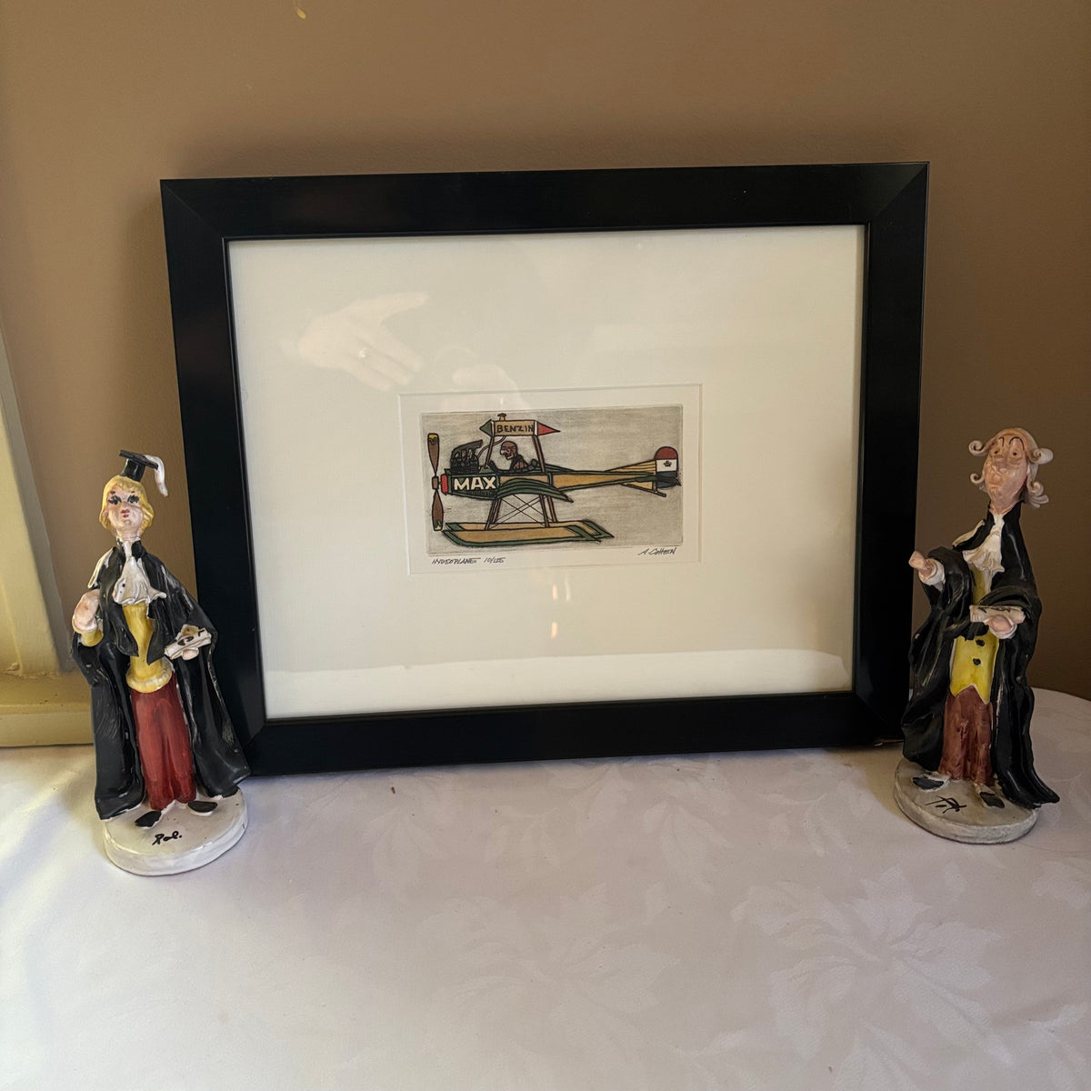 E142 Framed plane artwork grouping