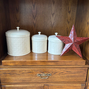 B445 Tin canisters and star