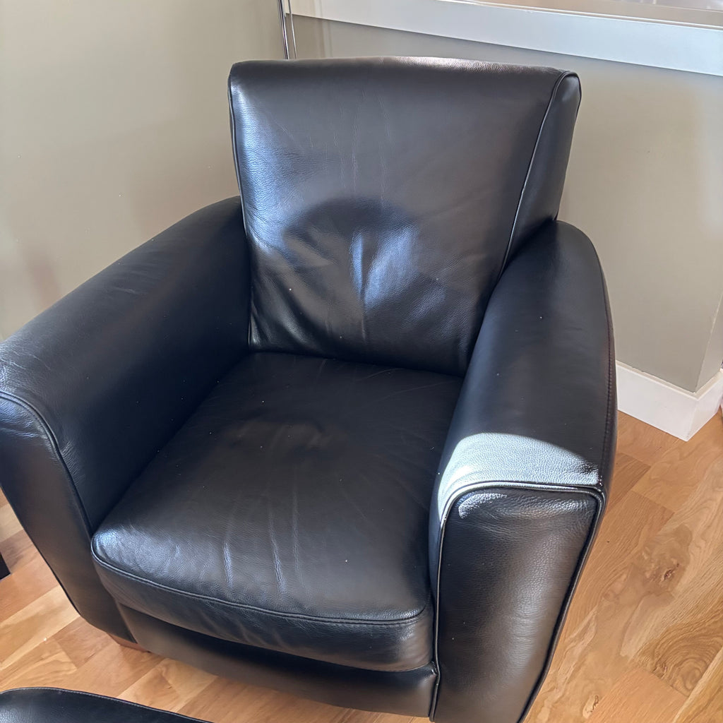 D100 Natuzzi Editions black leather arm chair and ottoman