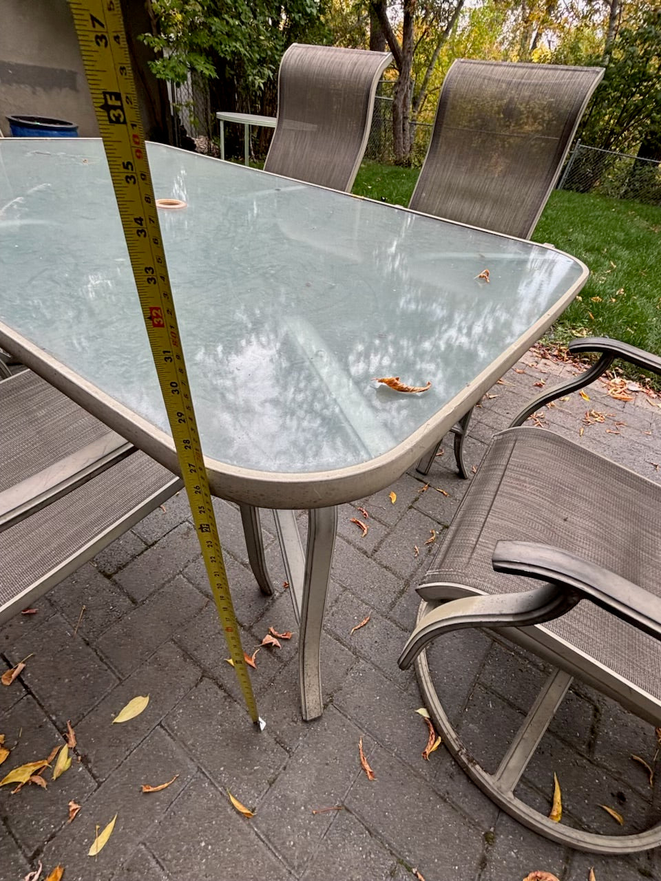E323 Patio table with 6 chairs, red umbrella and umbrella stand